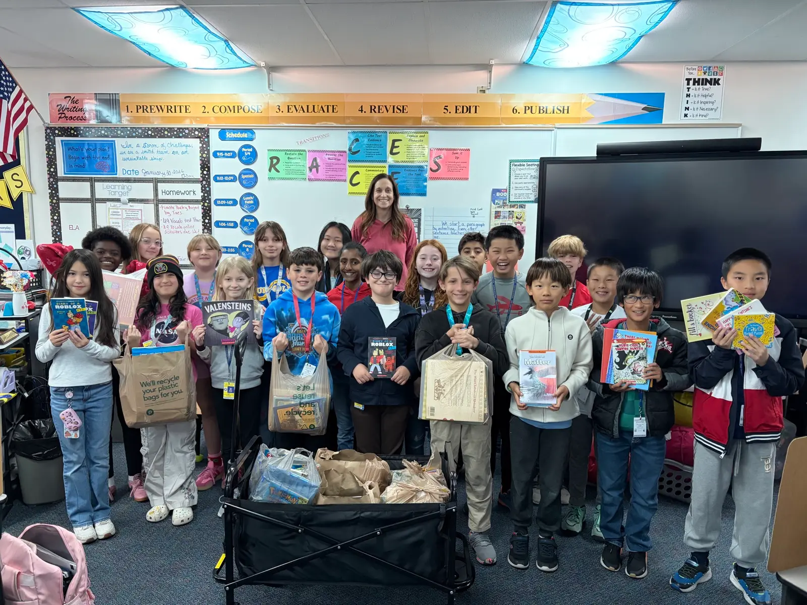 Pine View Book Drive — donated children's books being sorted